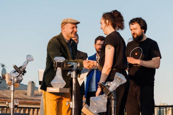 Doc Alliance Award Presentation 2024 - f.l. René Kubášek (Ji.hlava IDFF), James Berclaz-Lewis (Visions du Réel), award winner Camille Vigny, jury member Marko Grba Singh